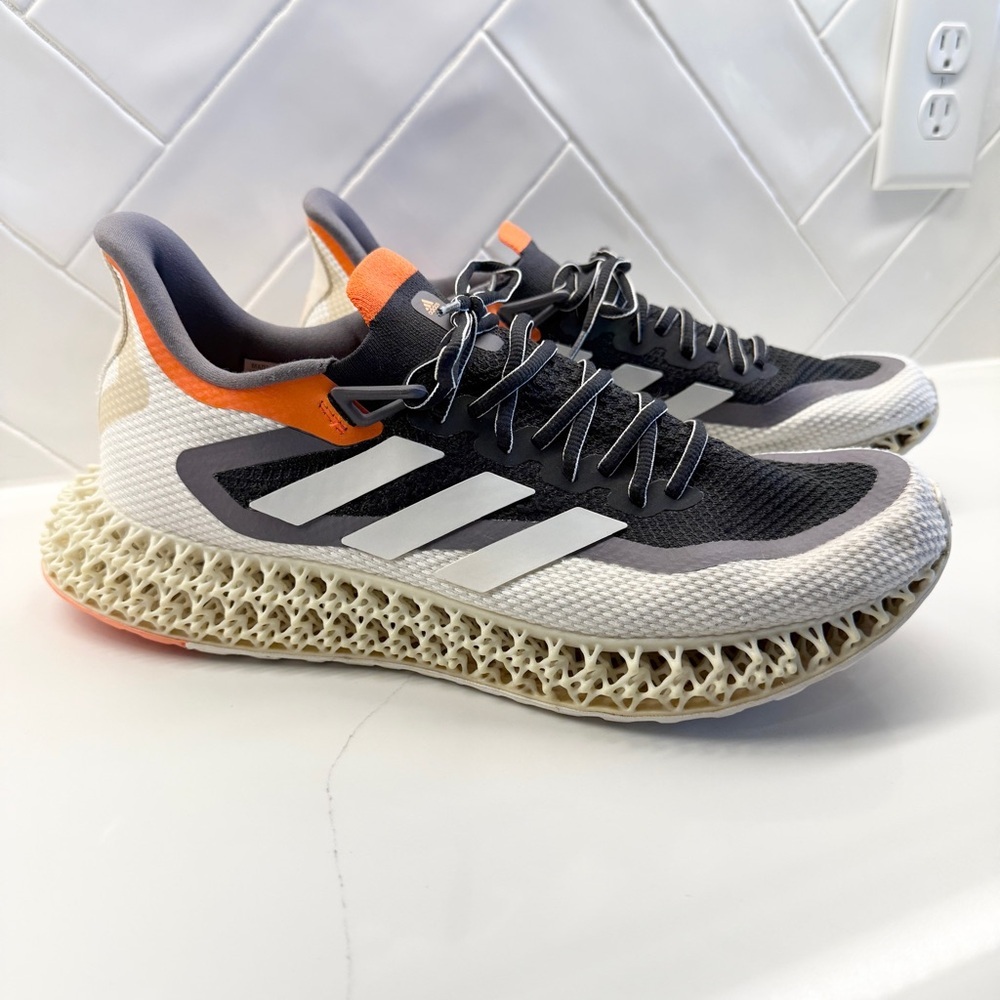 Adidas Men's Black and White Sneakers with Orange Accents